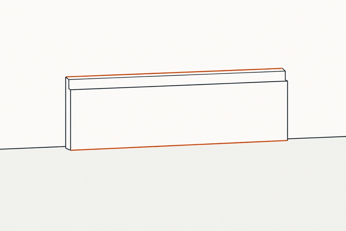 A length of trim standing against the bare wall with nothing holding it, the lines where it meets wall and floor picked out