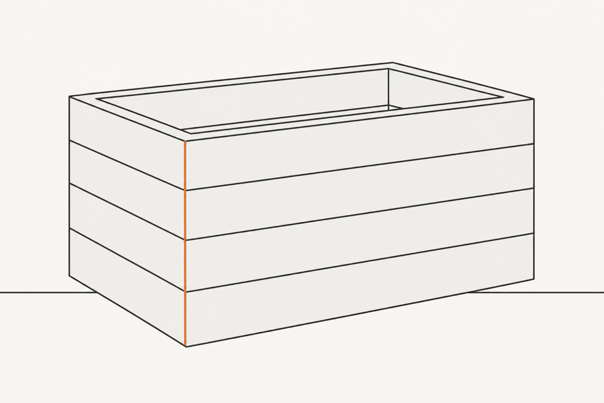 The planter's sprung corner pushed shut, a single seam running down where the boards now meet