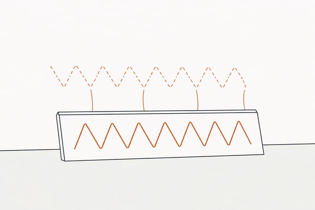 The trim pulled back off the wall, a matching zigzag print left on the wall and fine strands stretching between the two